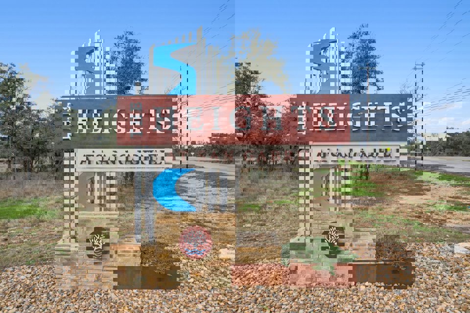 A sign on the side of a road.