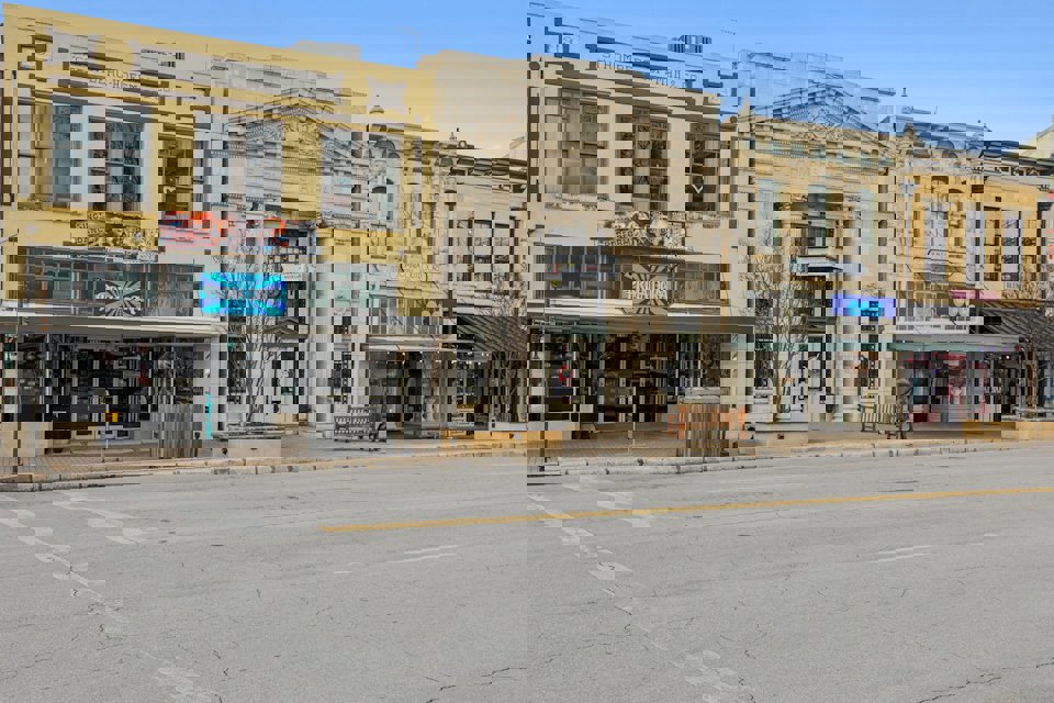 A street with buildings along it.