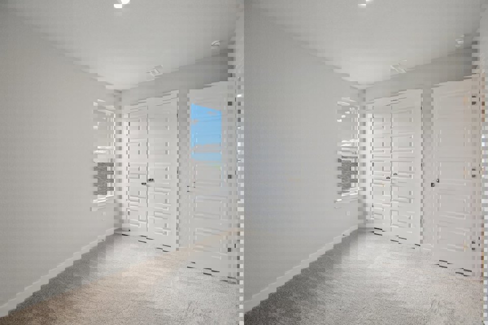 A room with white doors.