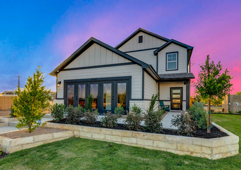 A house with a large front yard.