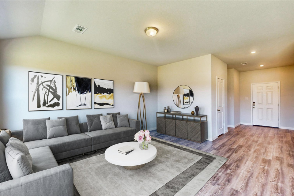 A living room with a couch and a coffee table.