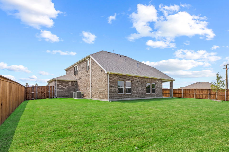 A house with a fence around it.