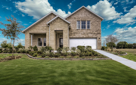 A house with a large front yard.