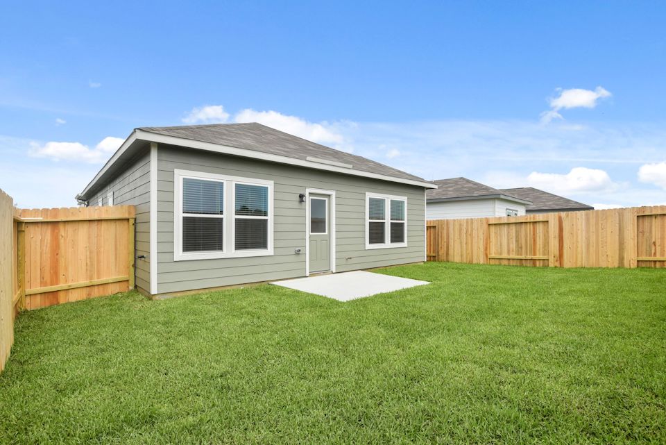 A house with a fence around it.