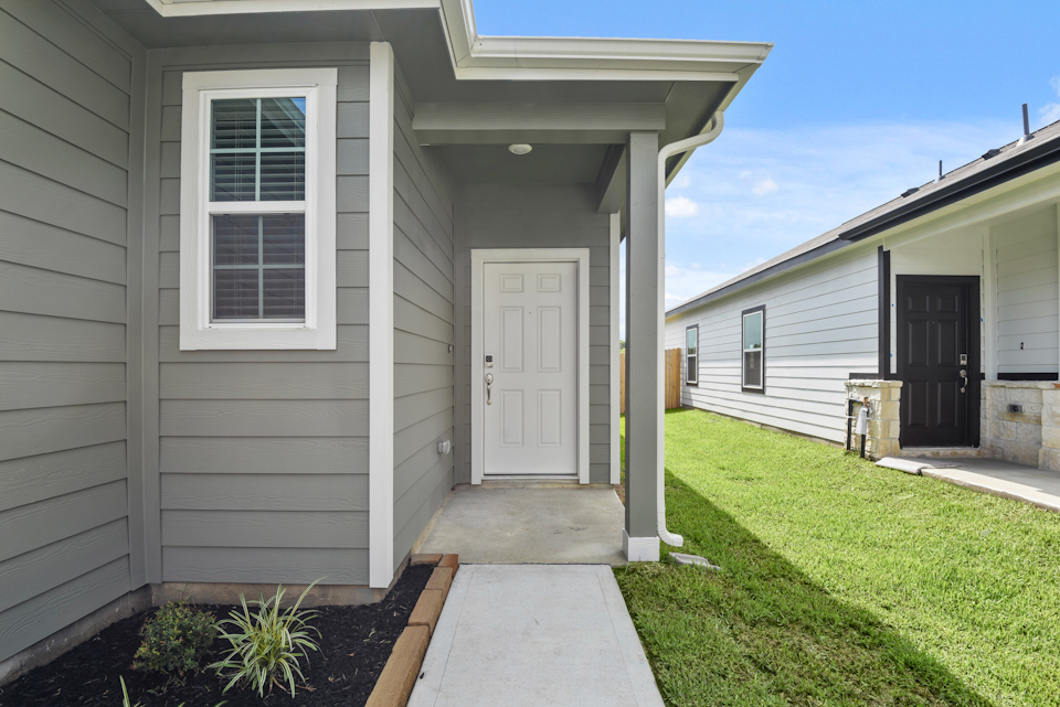 A house with a front yard.