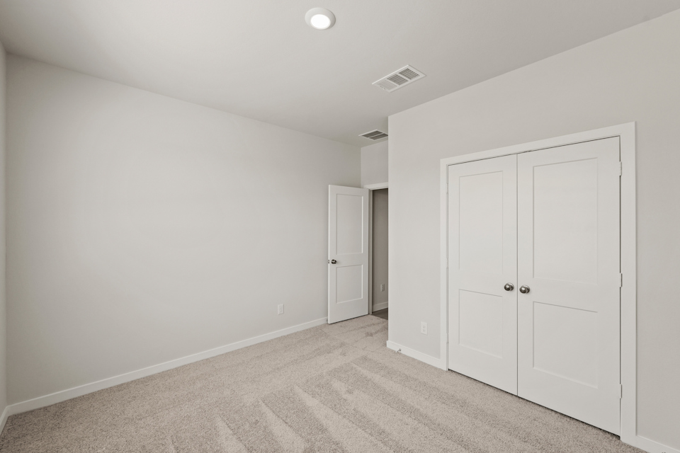 A room with white doors.