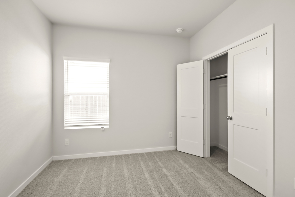 A room with white doors.