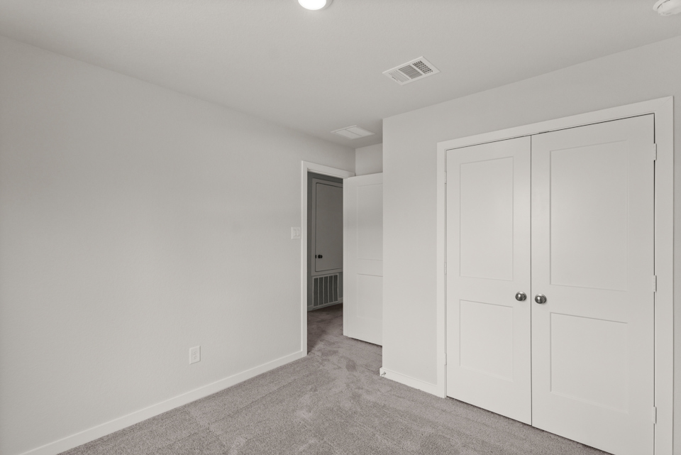 A room with white doors.