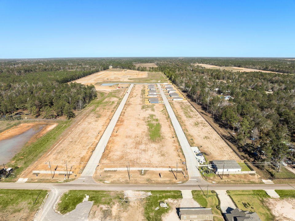 A road with a few cars on it.