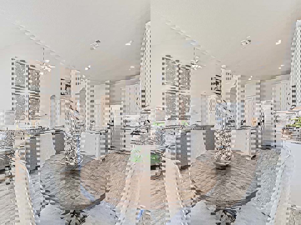 A kitchen with a dining table.