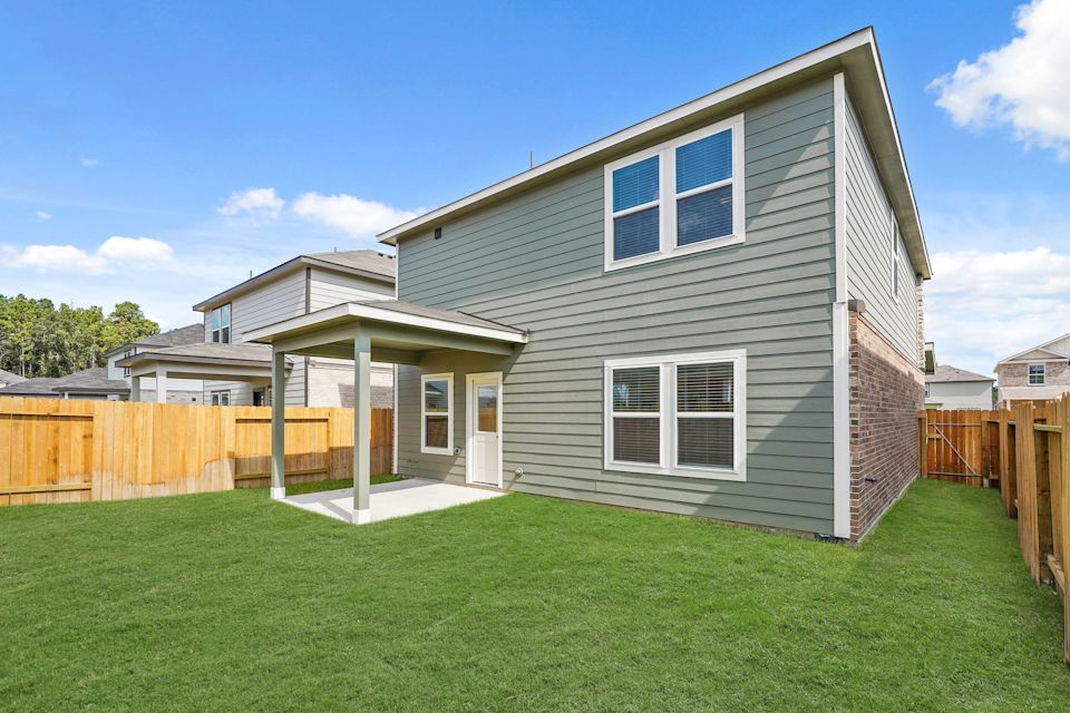 A house with a fence around it.