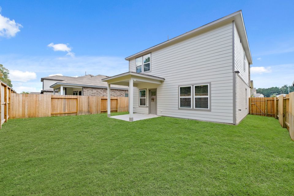 A house with a fence around it.