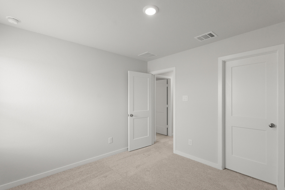 A room with white doors.