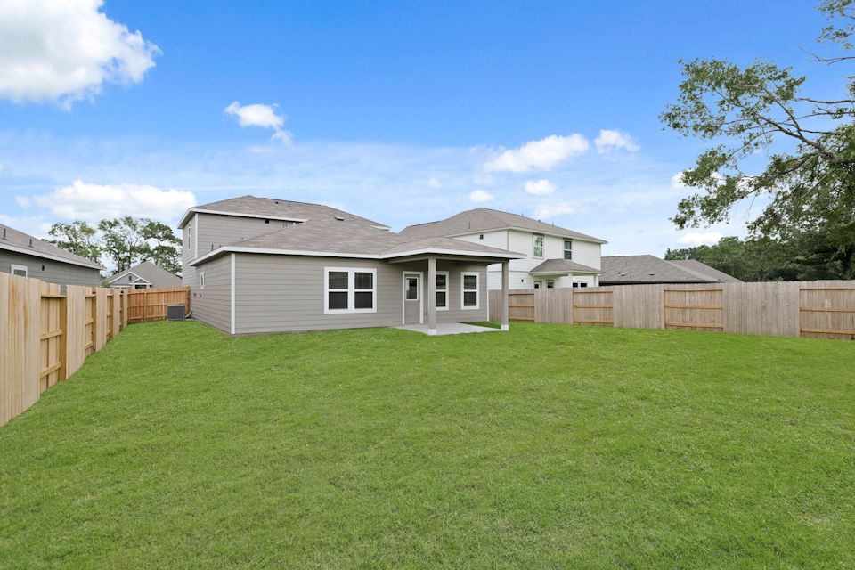 A house with a fence around it.