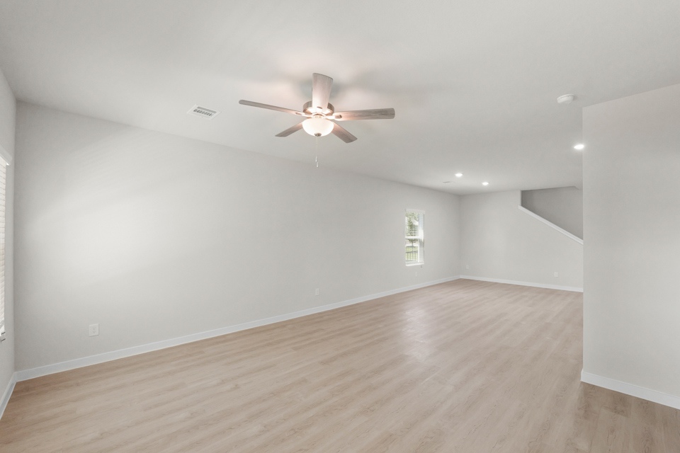 A ceiling fan in a room.