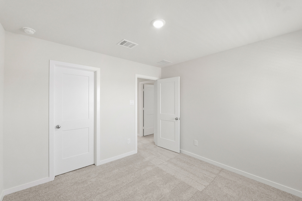 A room with white doors.