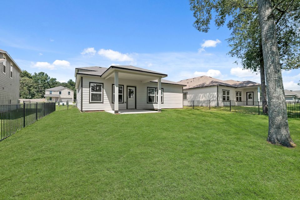 A house with a fence around it.