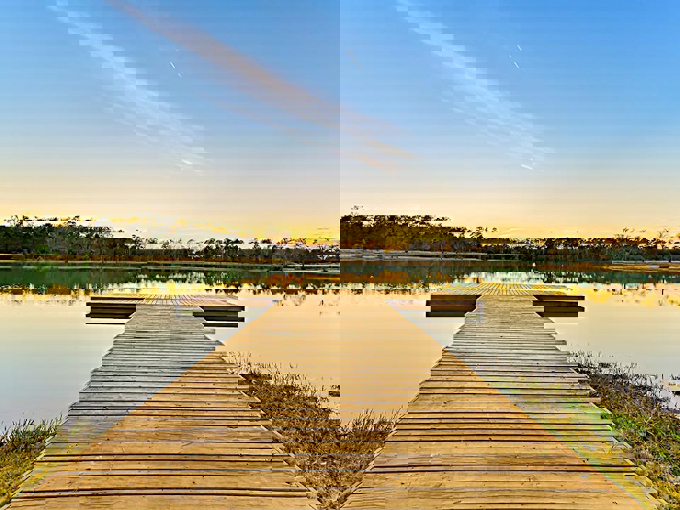 A wooden dock over a body of water.