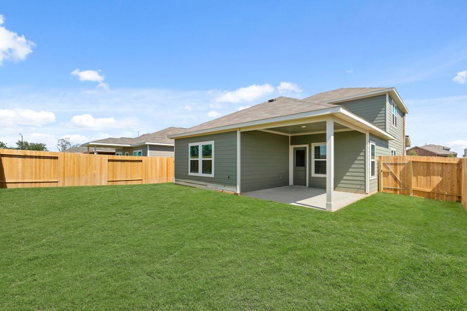 A house with a fence around it.