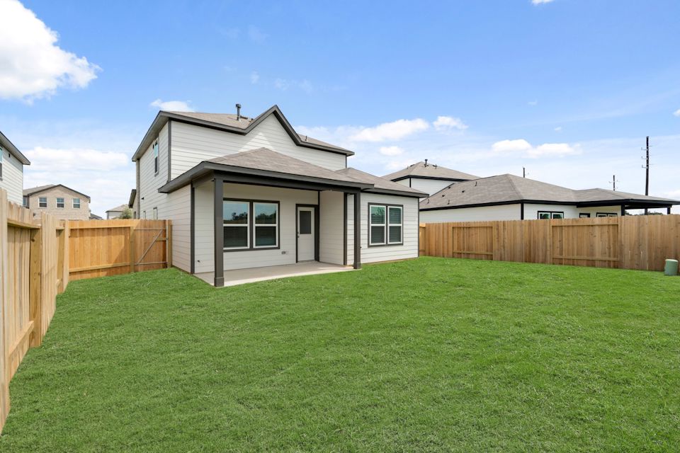 A house with a fence around it.