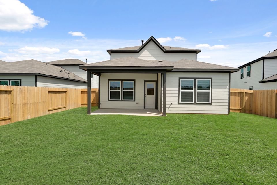 A house with a fence around it.