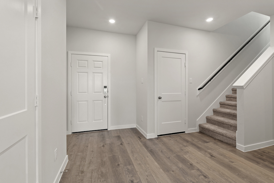 A staircase leading to a door.