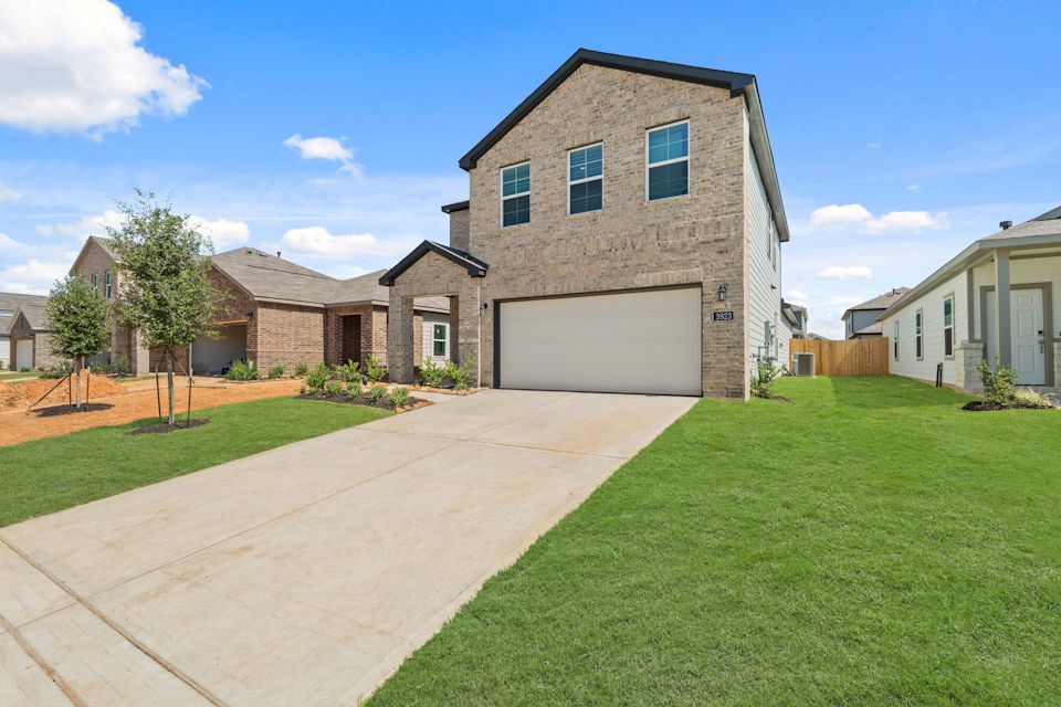 A house with a driveway.