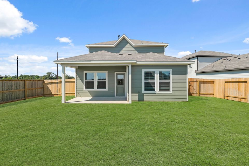 A house with a fence around it.