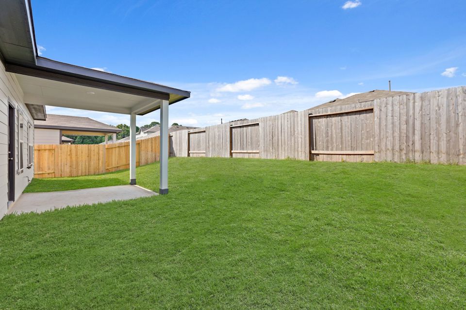 A row of wooden buildings.