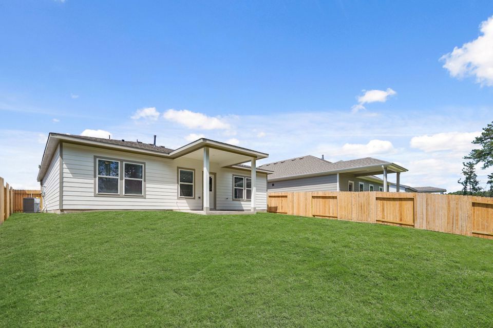 A house with a fence around it.