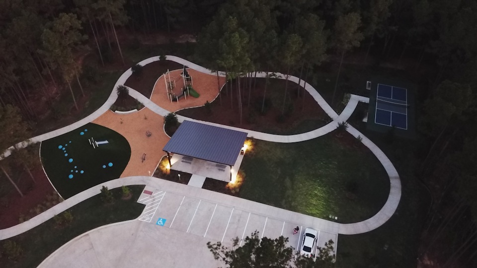 A building with a pool and a large circular pool.