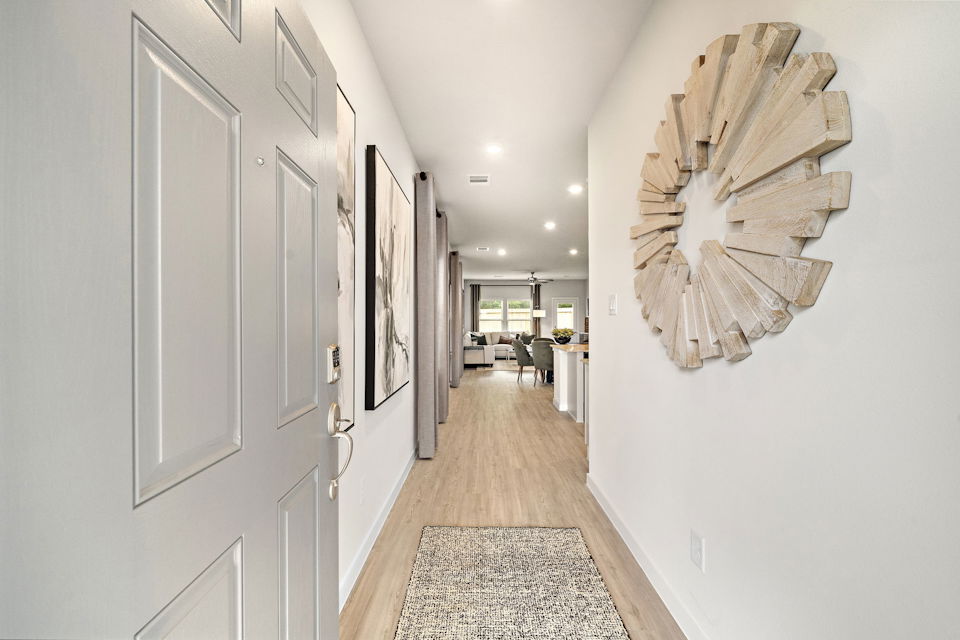 A hallway with white doors.