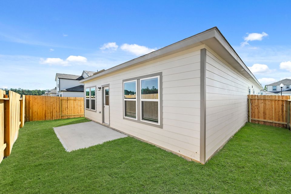 A house with a fence around it.