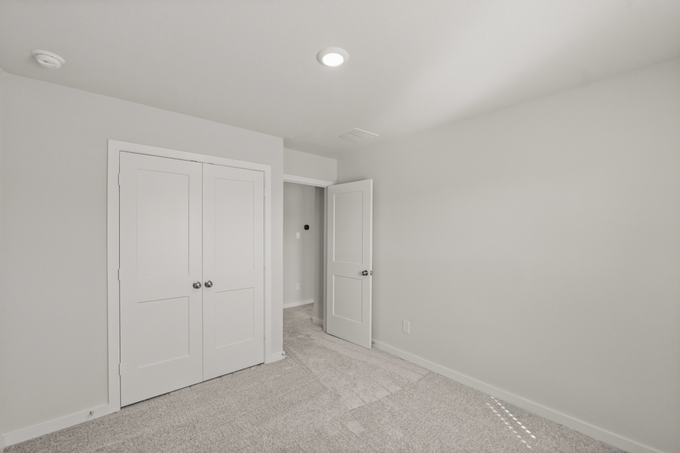 A room with white doors.