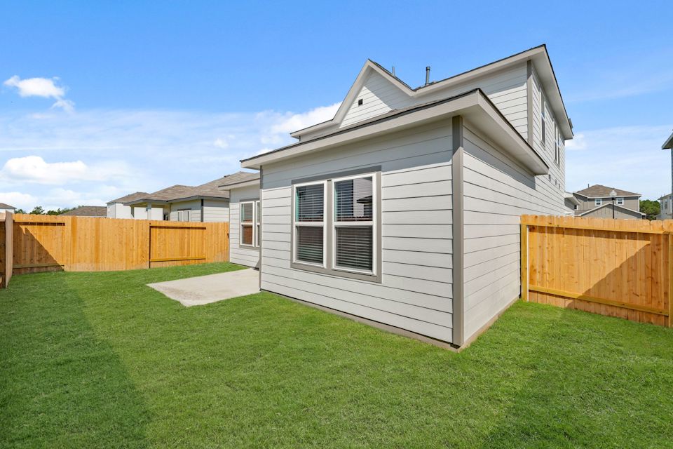 A house with a fence around it.