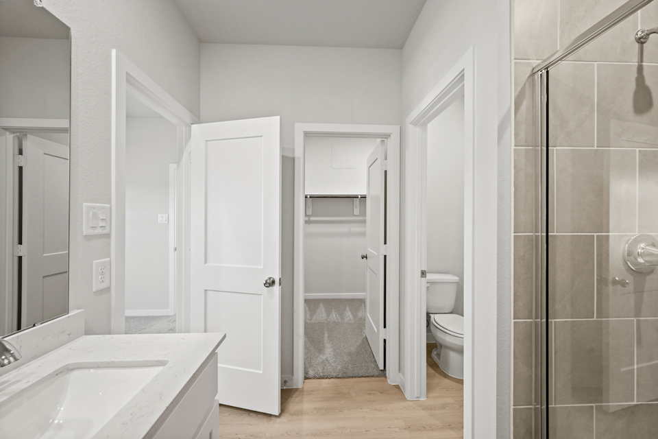 A bathroom with a glass shower.