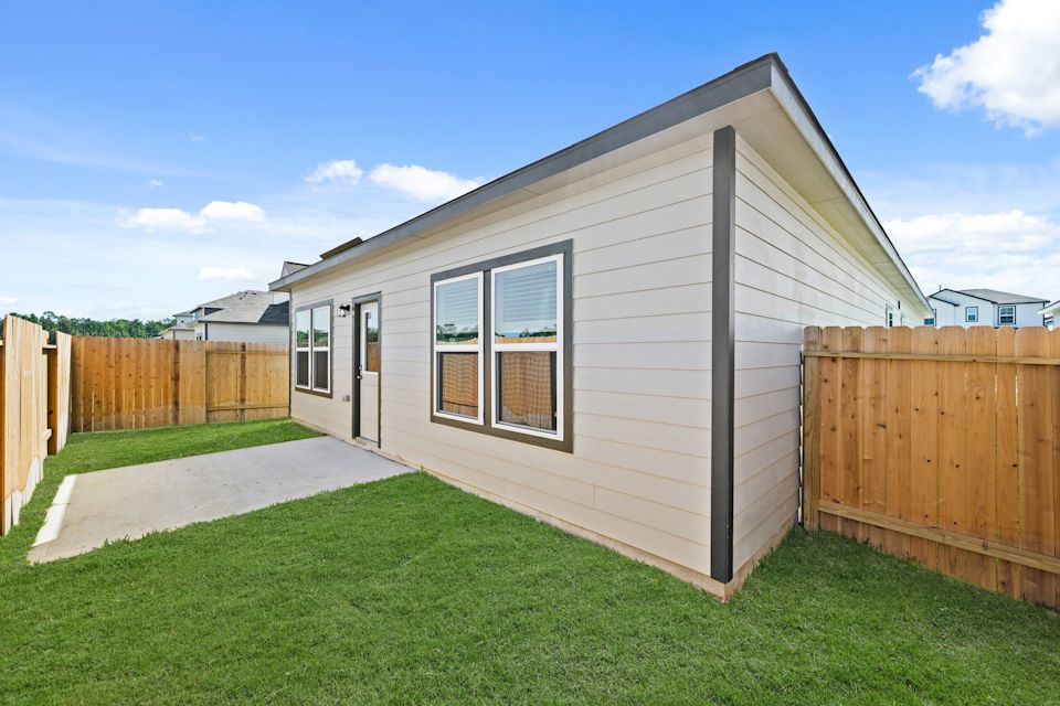 A house with a fence around it.