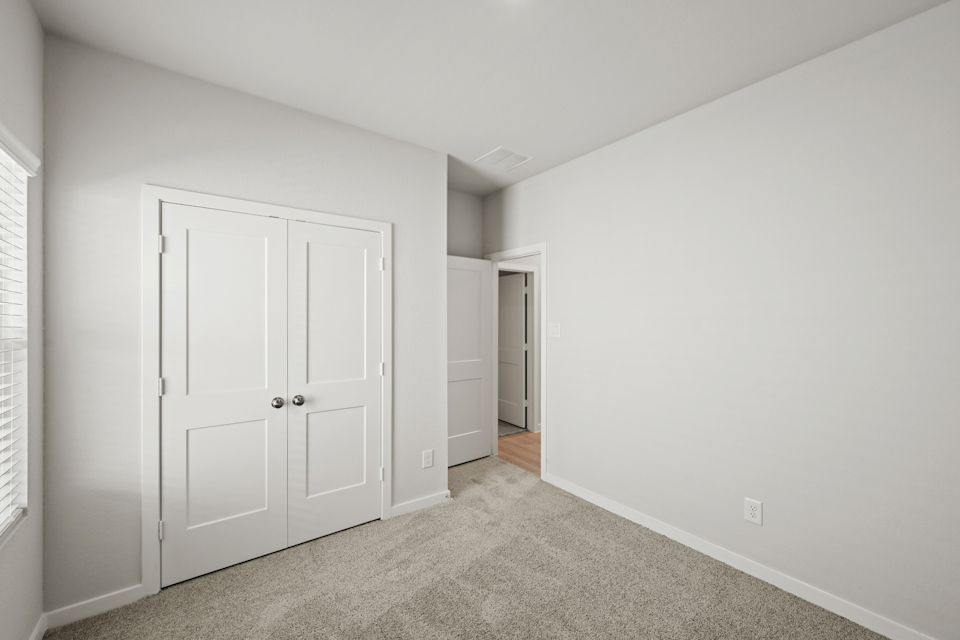 A room with white doors.