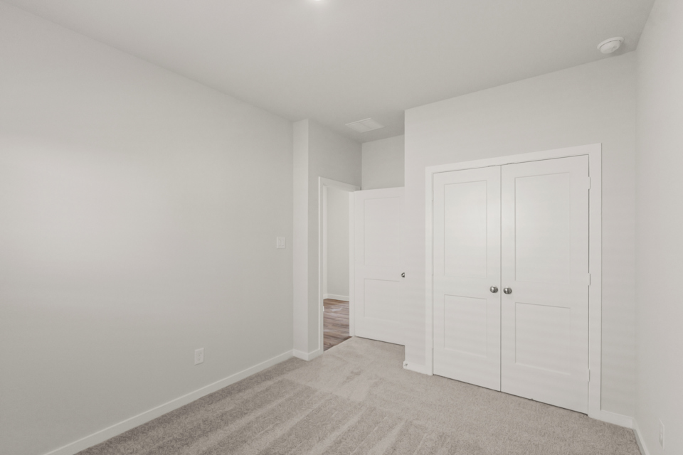 A room with white doors.