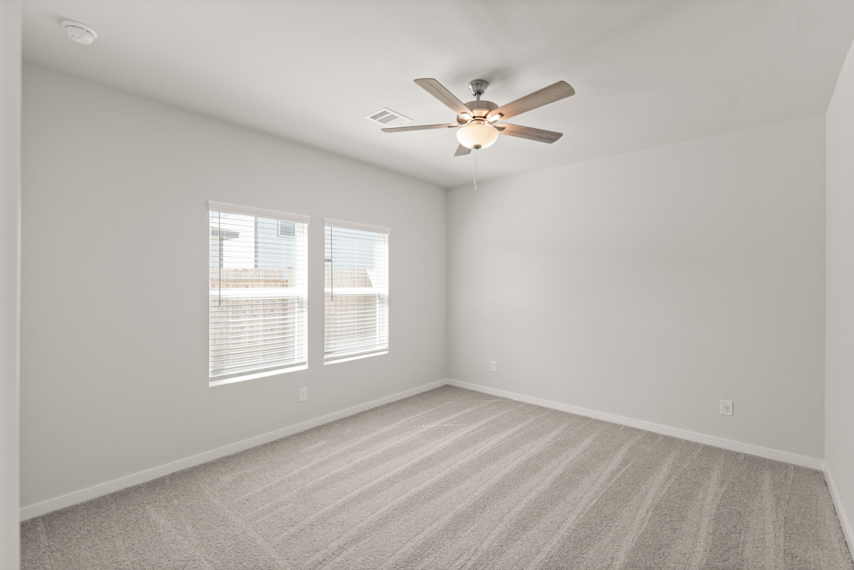 A ceiling fan in a room.