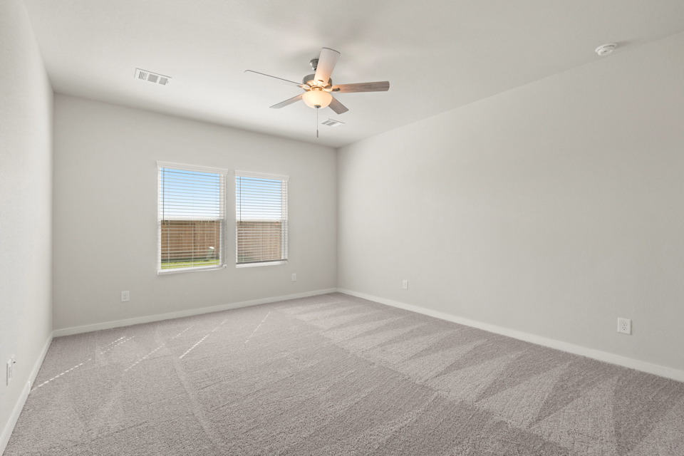 A ceiling fan in a room.