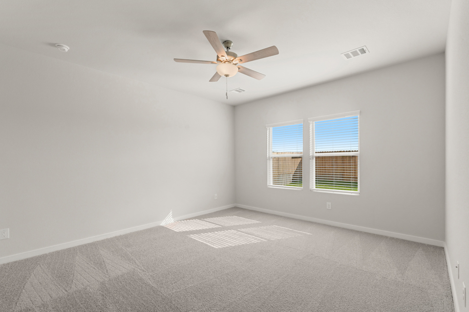 A ceiling fan in a room.