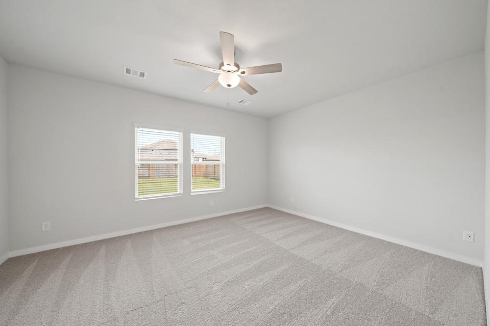 A ceiling fan in a room.