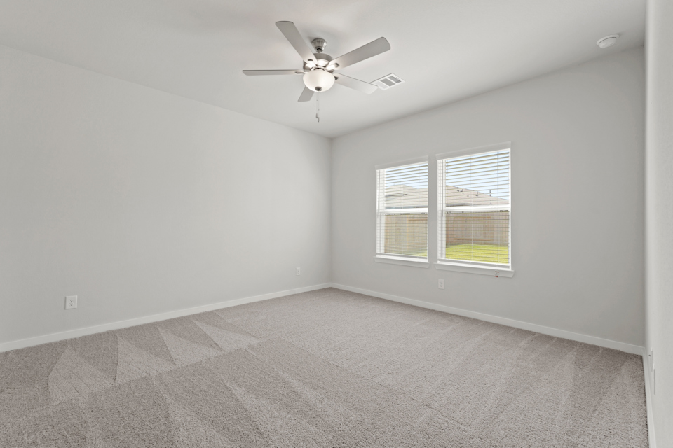 A ceiling fan in a room.