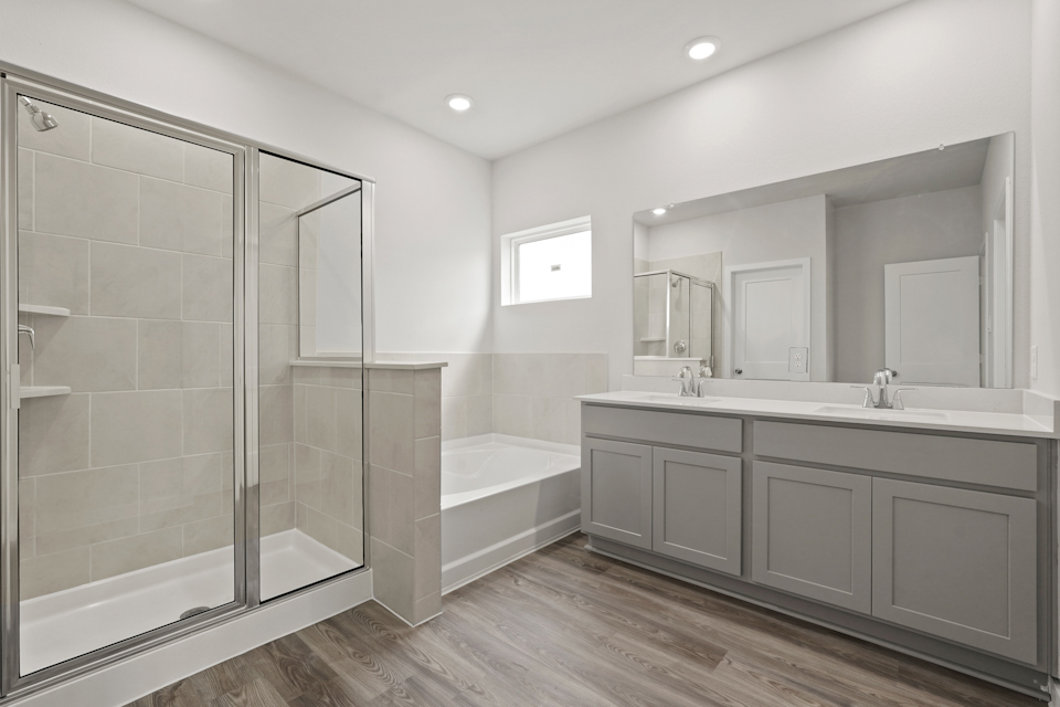 A bathroom with a glass shower.