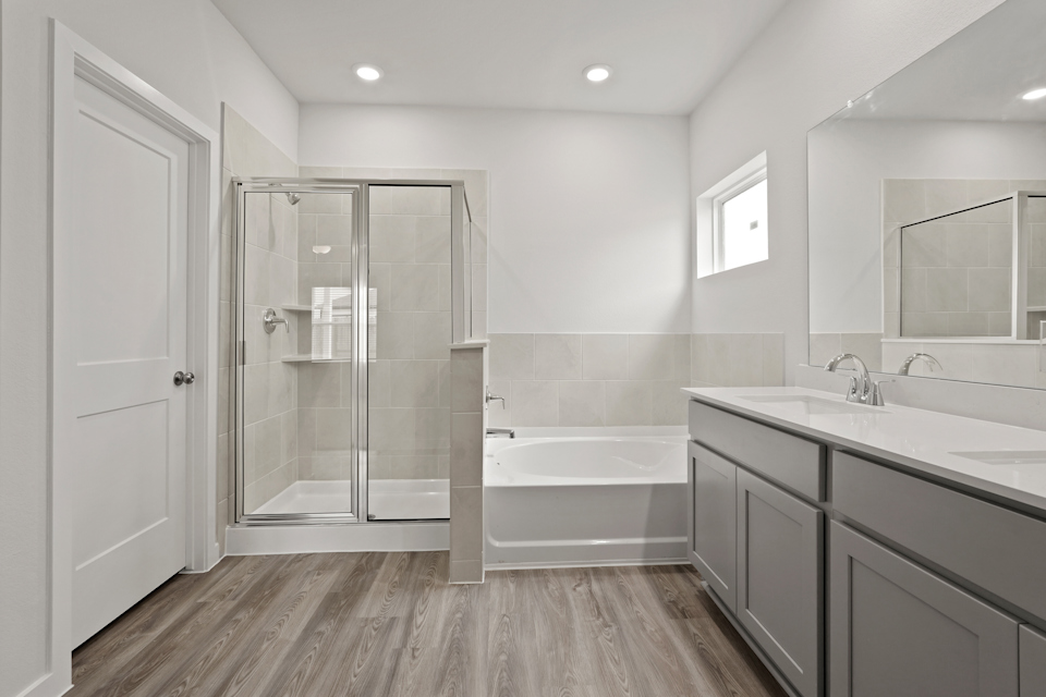 A bathroom with a glass shower.