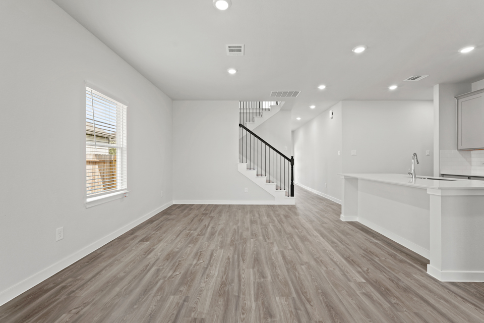 A bathroom with a wood floor.
