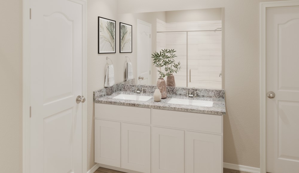 A bathroom with a marble countertop.