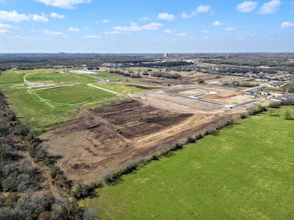 A landscape with a river running through it.