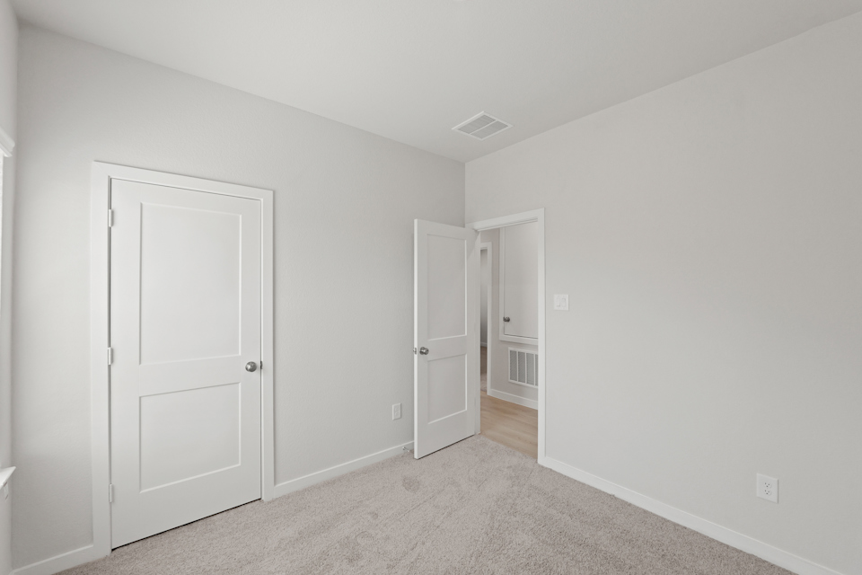 A room with white doors.